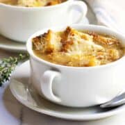 French Onion Soup served in white bowls