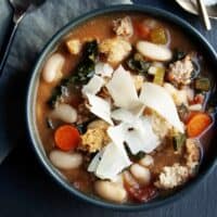 Ribollita served in a black bowl