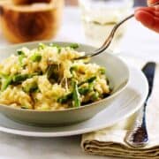 Cheesy Brown Rice Risotto in a ceramic bowl