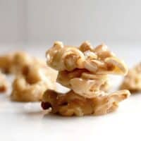 Cashew Brittle stacked on a marble board