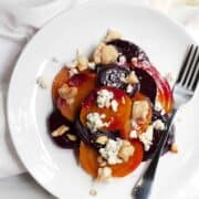 roasted beet salad served on a white plate