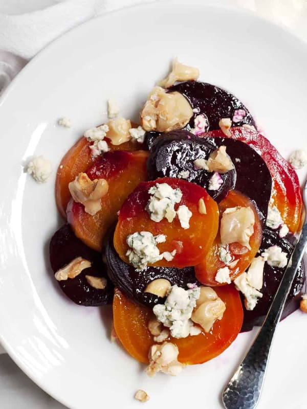 roasted beet salad served on a white plate