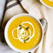 Vegan Butternut Squash Soup served in white bowls