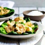 Shrimp-Remoulade-Salad_ served on white plates featured