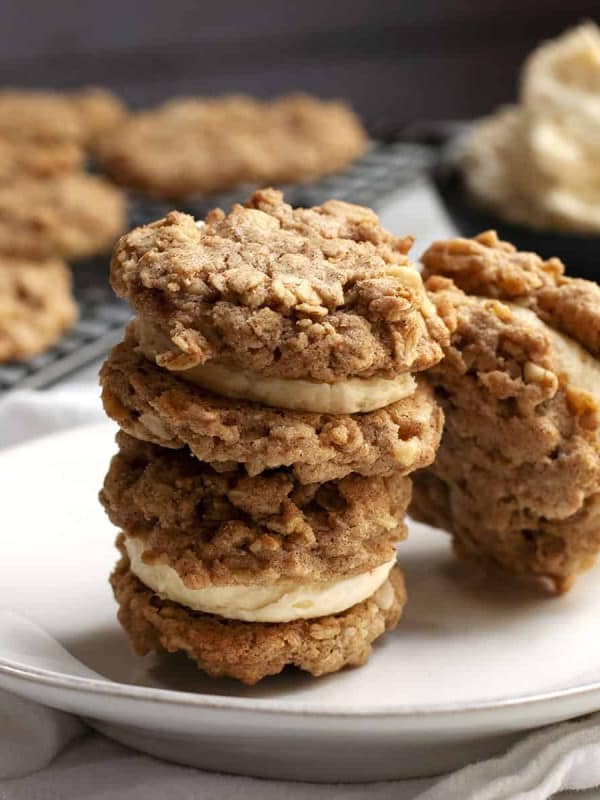 Oatmeal Sandwich Cookies stacked on a white plate