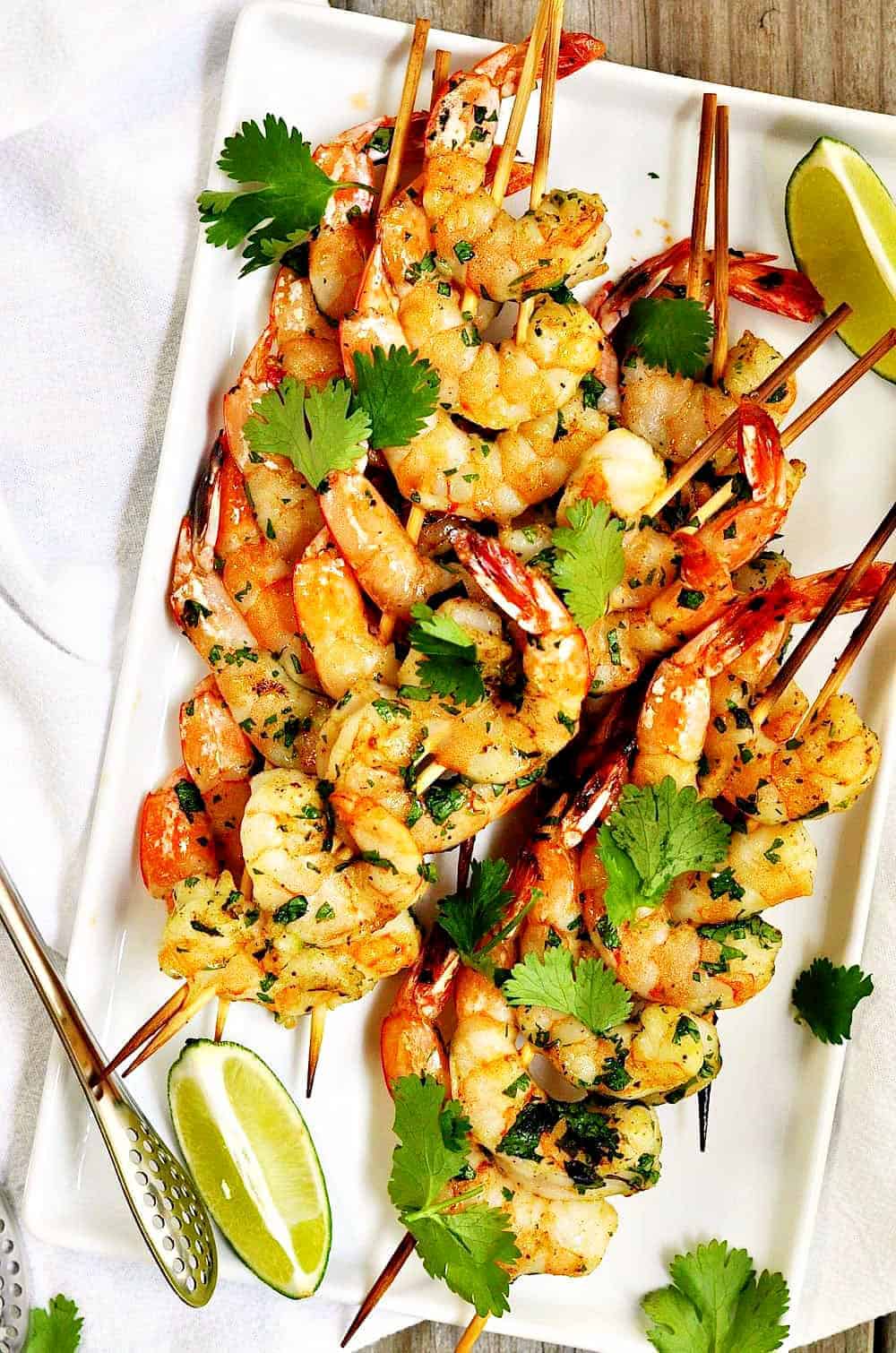 Grilled-Shrimp on a white platter photo from above