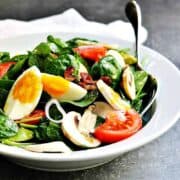 Spinach-Salad-Served in a white ceramic bowl featured