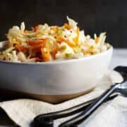 curtido slaw served in a ceramic bowl