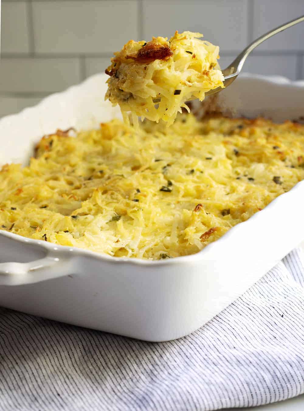 Cheesy Potatoes being served