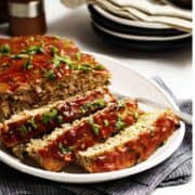 Turkey Meatloaf Sliced on a White Platter