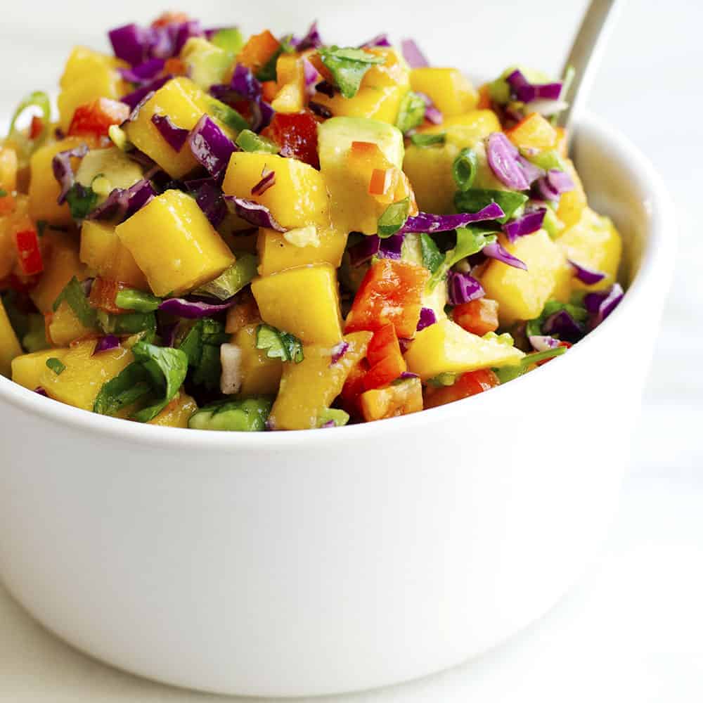 Mango Salsa served in a white bowl