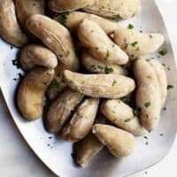 salt potatoes served on a brushed metal platter