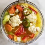 Giardiniera served in a glass canning jar