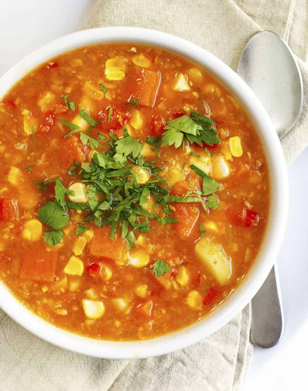 vegan corn chowder served in a white bowl