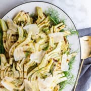 Grilled Fennel on an oval white platter photographed from above.