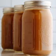 Homemade Pork Bone Broth in glass quart canning jars.