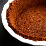 Gingersnap Crust in a white pie ceramic pie plate.