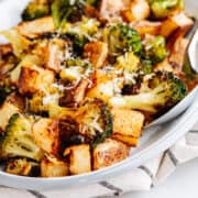 Roasted Potatoes and Broccoli on an oval platter.