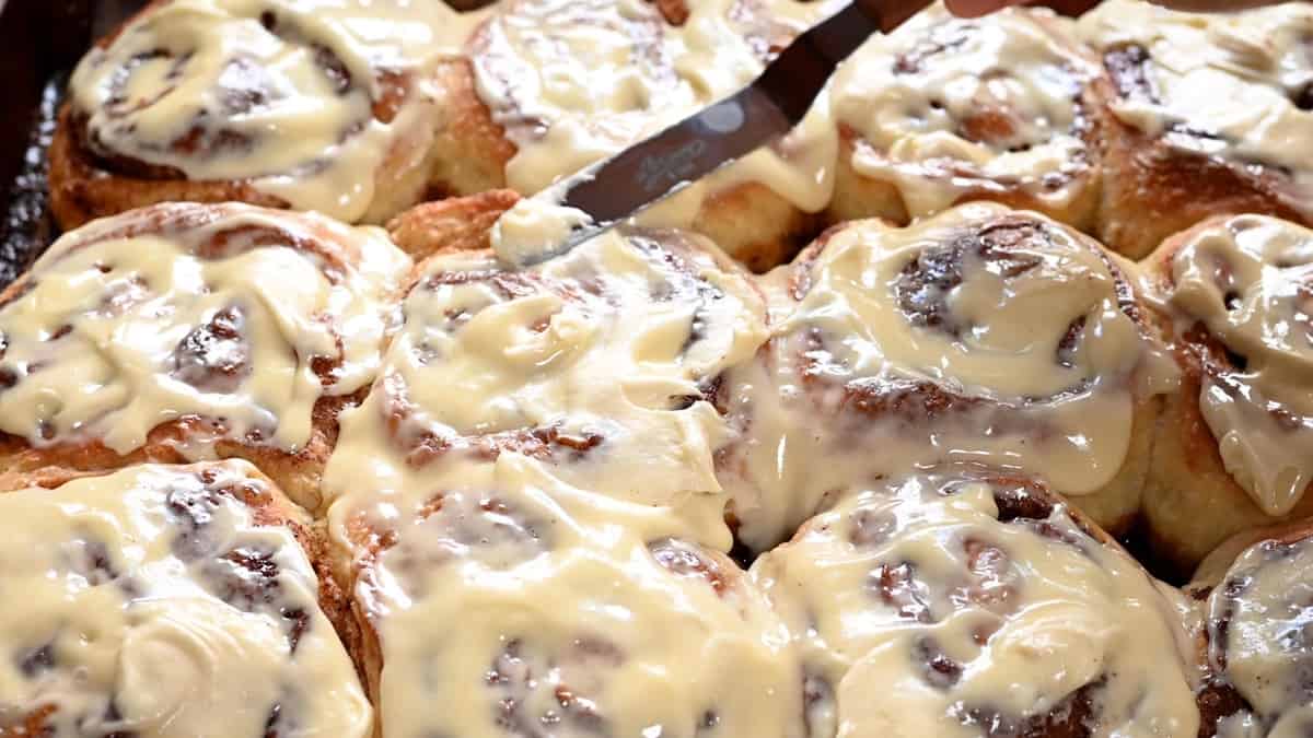 https://pinchandswirl.com/wp-content/uploads/2021/12/Frosting-Brioche-Cinnamon-Rolls-with-cream-cheese-frosting.jpg