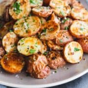 Roasted Baby Potatoes served on a gray plate.