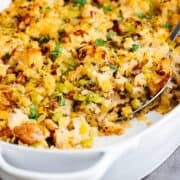 Sourdough Stuffing served in a white oval baking dish.