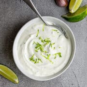 Lime Crema served in a white bowl and photographed from above.