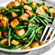 Roasted Green Beans and Potatoes served on a white platter.