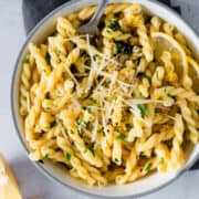 Gemelli Pasta with Lemon and Garlic in a white bowl, photographed from above.