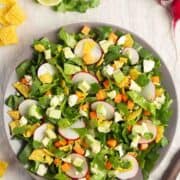 Mexican Chopped Salad served on a gray plate and photographed from the top.