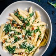 Pancetta Pasta served in a white bowl and photographed from the top.