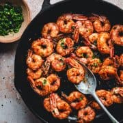 Cajun Shrimp served in a cast iron skillet and photographed from the top.