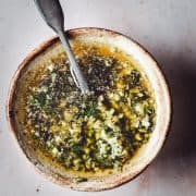 Garlic Parmesan Wing Sauce in a ceramic bowl photographed from the top.