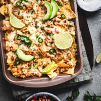Shrimp Nachos served in a baking pan.