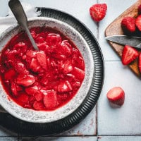 Strawberry Compote served in a dappled gray bowl.