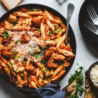 Cajun Chicken Pasta served in a black bowl and photographed from the top.